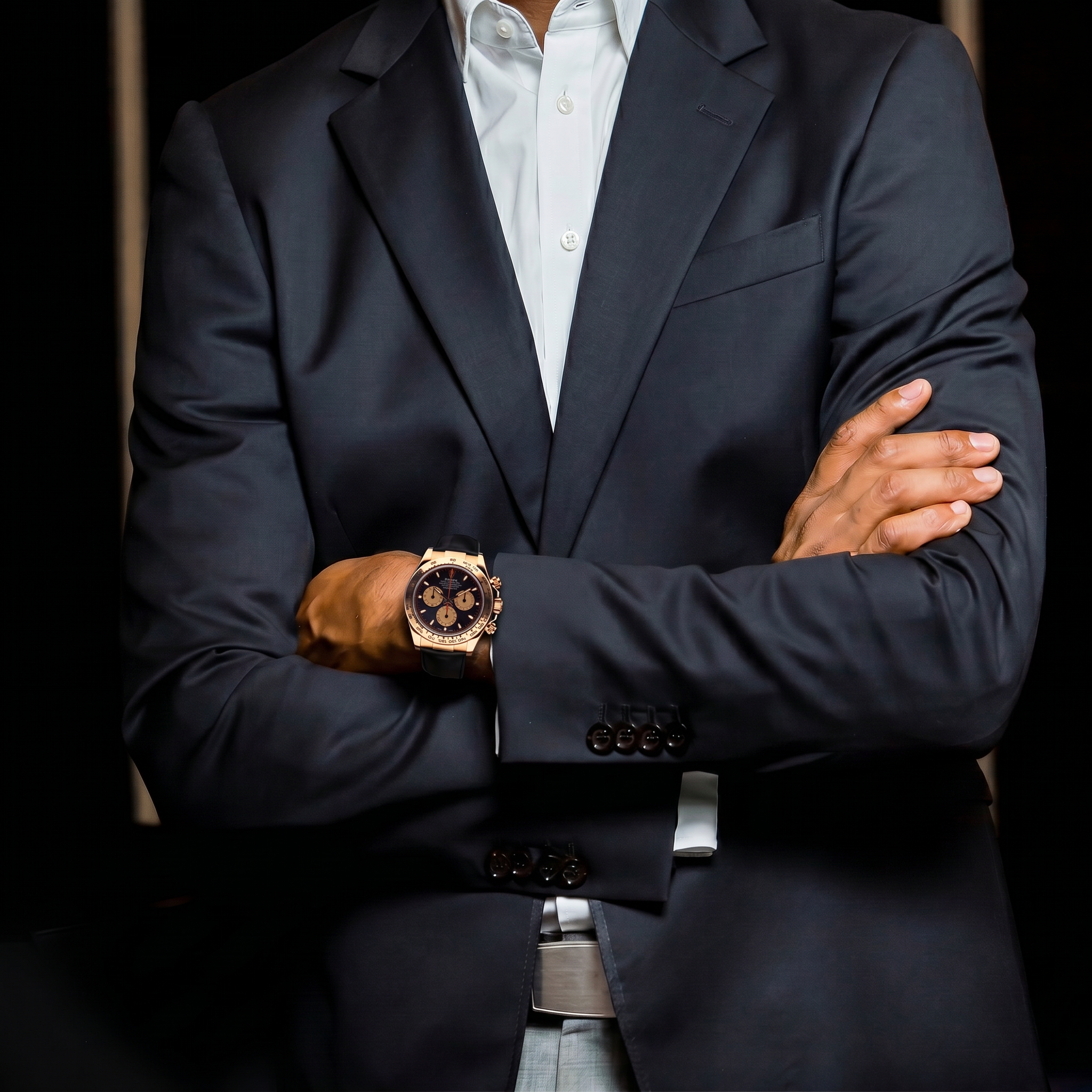 Uomo in blazer sartoriale con Rolex Cosmograph Daytona